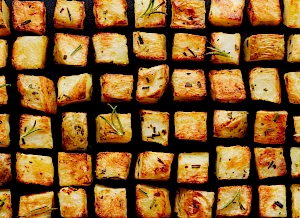 Photograph of Cubes of Roasted Potato with rosemary