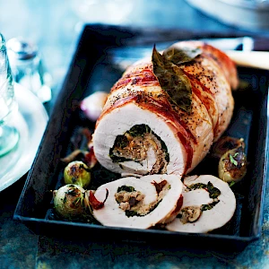 Photograph of Waitrose Turkey Roulade in a roasting tray with stuffing