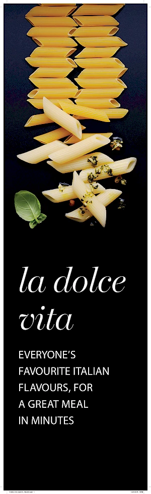 Advert for Dolce Vita. Photograph of raw and cooked penne pasta with pesto and basil leaf.