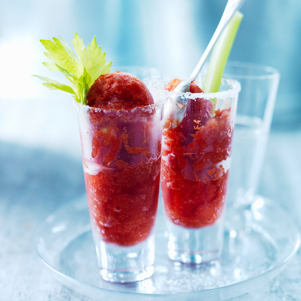 Photograph of a Bloody Mary Sorbet in glasses with celery