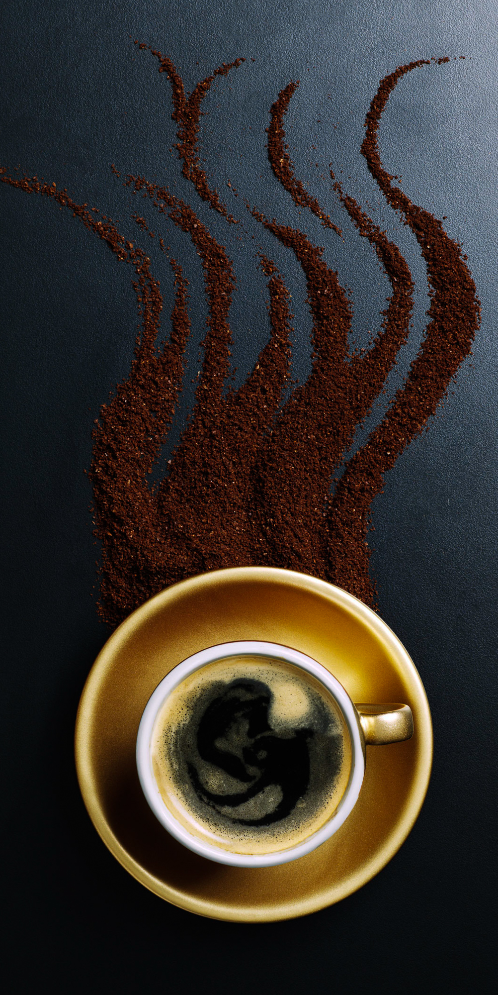 Cup of Coffee with Ground Coffee Pattern of Steam
